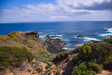 Fototapeta na wymiar The coast of the sea with cloudy blue sky background in Australia