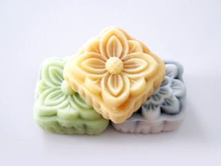 Top view of colorful snow lotus dessert, mooncake bua hema isolated on white background.