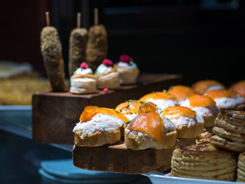 Close-up of a typical basque pincho or tapa made of salmon and crayfish in a bar of Vitoria, Basque Country, Spain