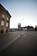 Fototapeta na wymiar Empty cathedral bridge with Hans Waldmann statue and Grossmunster in the morning in the city of Zurich Switzerland