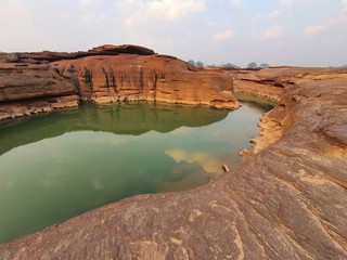 Beautiful scenary view at Sam Phan Bok, Ubon Ratchathani in Thailand. When water level of Mekong river down, beautiful shape of stones with pond can be found.