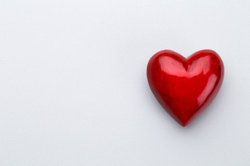 Red heart, valentine day greeting card. Wooden hearts background.