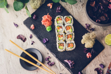 Fototapeta na wymiar sushi set in menu on black board