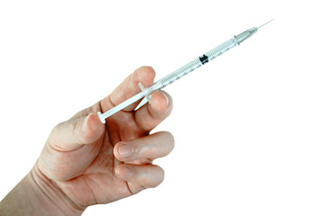 Hypodermic syringe on doctor 's hand with white background , picture have clipping path.