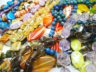 jewelry fashion beads necklace background with colorful crystals