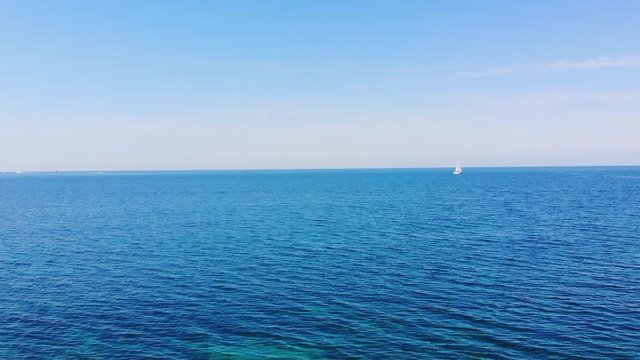 sailboat at the beautiful nearshore Adriatic sea in Umag, Croatia.  Aerial view