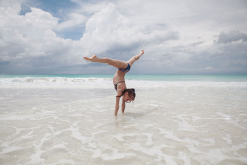children have fun playing on the beach