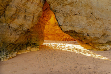 Rocks on the shore of Atlantic ocean in Algarve region in south Portugal. Beautiful summer landscape