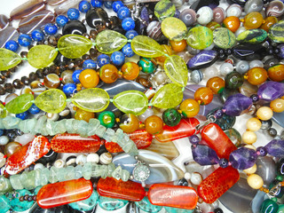 jewelry fashion beads necklace background with colorful crystals