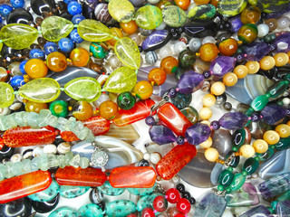 jewelry fashion beads necklace background with colorful crystals