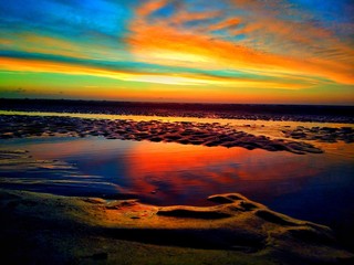 Fototapeta na wymiar Manu ainbowcolour Sunset at beach