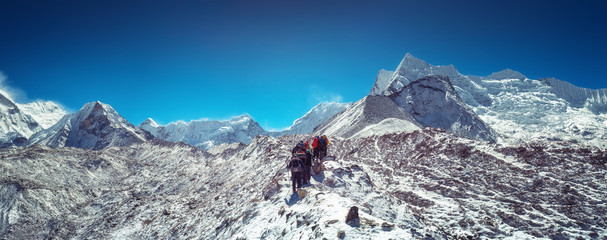 Mountaineers make climbing Mount Island Peak Imja Tse , 6,189 m, Nepal. - obrazy, fototapety, plakaty