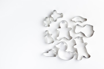 metal cookie cutters on white background