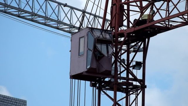Slowly turning cab of an old tower crane