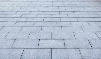 Tidy stone floor. The ground extending forward.