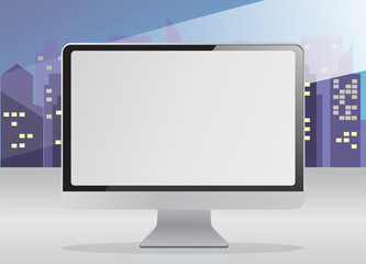 Сomputer near the window with city night.