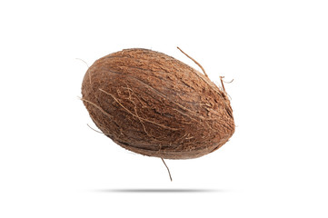  closeup of coconut with sticking fibers isolate on white background