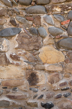 wall structure which consists of stones of different sizes.