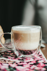 Fancy latte coffee in glass jar