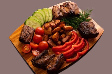 Shashlyk with salad high angle view