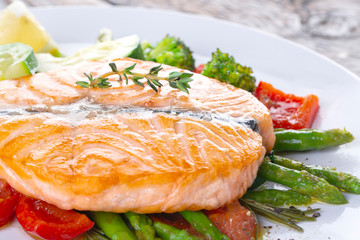 Grilled salmon steak butterfly with vegetables