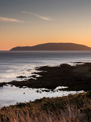 Fototapeta premium View over Finisterre from Cape Cee at sunset, Galicia, Spain