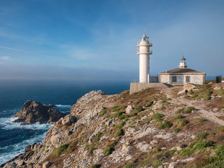 Fototapeta na wymiar Lighthouse at Cape Tourinan, Costa da Morte, Galicia, Spain