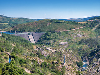 Naklejka premium Concrete dam of the Xallas river between the villages Ezaro and O Fieiro, Death Coast, Galicia, Spain