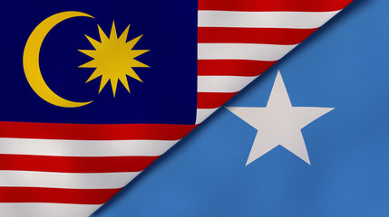 The flags of Malaysia and Somalia. News, reportage, business background. 3d illustration