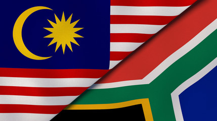 The flags of Malaysia and South Africa. News, reportage, business background. 3d illustration
