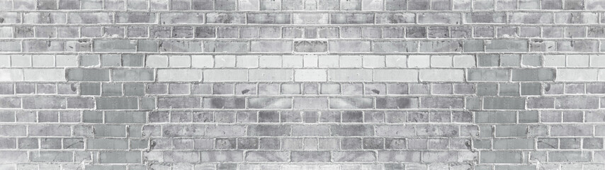 White gray painted damaged rustic brick wall texture banner panorama	
