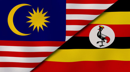 The flags of Malaysia and Uganda. News, reportage, business background. 3d illustration