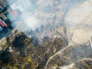 Fire near the garage cooperative. Aerial drone view.