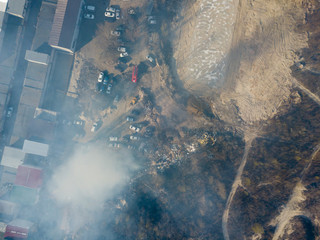 Fire near the garage cooperative. Aerial drone view.