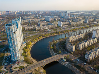 Obraz premium Residential area Rusanovka in Kiev in the evening sunshine. Aerial drone view.