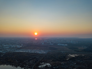 Fototapeta na wymiar Sunset over the lake in the Kiev city. Aerial drone view.