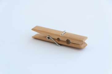 Wooden clothes pin isolated on a white background. Clipping path