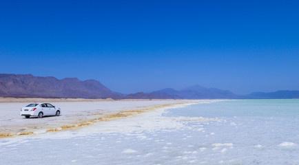 Fototapeta na wymiar Close up view to the Salt pieces on the Coast line of the Lake Assal, Djibouti