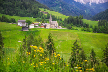 Fototapeta na wymiar Alpine landscape with rocky mountains in Dolomites at Santa Maddalena Alta