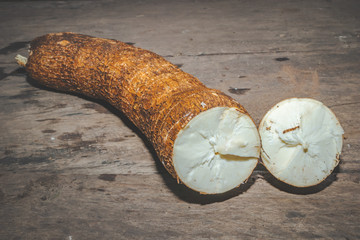 Cassava plant (Manihot esculenta) cut up and ready to be cooked and eaten, Uganda, Africa
