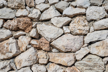 Mauer aus Feldsteinen als Hintergrund