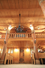 KARPACZ, POLAND - MARCH 09, 2020: Interior of the old wooden temple Vang (Wang). Medieval Norwegian stave church which was transferred from Vang in Norway to Karpacz, Poland, Europe.