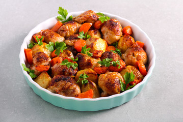 Roast chicken with potatoes and carrots
