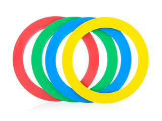 Children's colorful plastic hoops on a white background. Pyramid rings. Concept of children's educational games. Development of children's motor skills and thinking