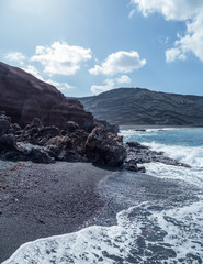 The surf on volcanic black beach El Golfo, island Lanzarote