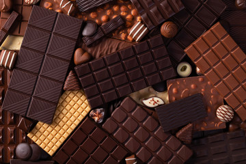 assorted chocolate bar and candy background, delicious food for dessert