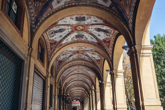 Painted portico of house located on Cavour Square in historic part of Bologna city, Italy