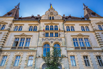 Fototapeta na wymiar Facade of Town Hall in historic part of Sighisoara city, Romania