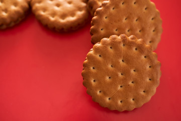 round biscuits on a red background