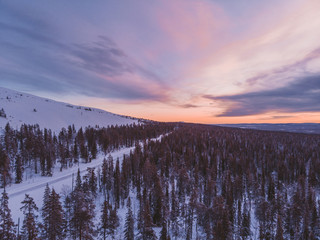 Charming winter sunset in Lapland
